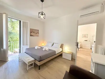 Letto o letti in una camera di Suite Borgo Verde-5 minutes from the station