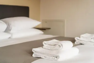 Letto o letti in una camera di La Casa di Angelique - Florence Dolce Vita