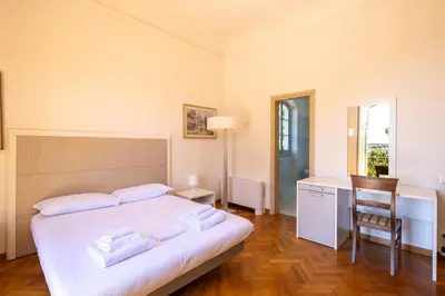 Letto o letti in una camera di Chianti Relais Villa Ghibellina