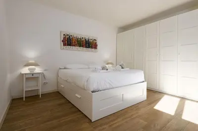 Letto o letti in una camera di UNYCA - Elegant Apartment in Oltrarno Florence