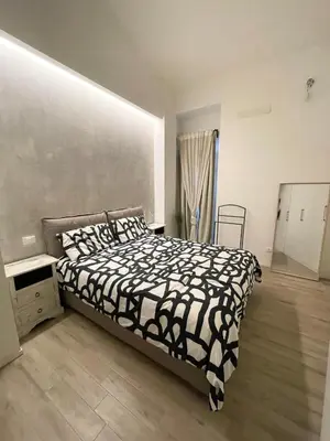 Letto o letti in una camera di Glamour Suite Toselli