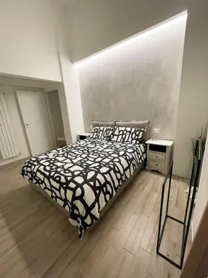 Letto o letti in una camera di Glamour Suite Toselli