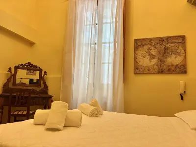 Letto o letti in una camera di Soggiorno Relax Dei Medici