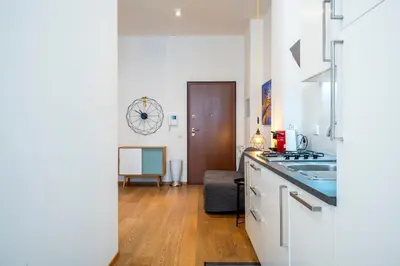 Cucina o angolo cottura di Loft Moderno a due passi dalla Tranvia 1BDR