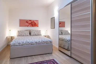 Letto o letti in una camera di Casa Emilia 65