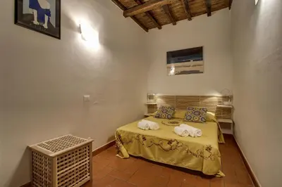 Letto o letti in una camera di Pilastri Apartment Near Santa Croce