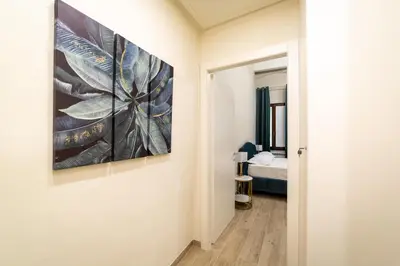 Letto o letti in una camera di appartamento Via deiNeri 22