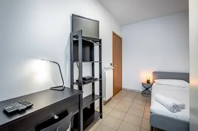 Letto o letti in una camera di YD Settimello with parking