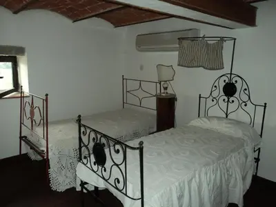 Letto o letti in una camera di Michelangelo