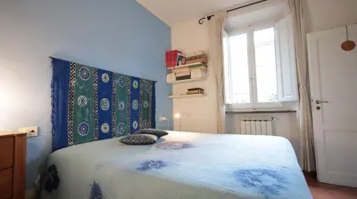 Letto o letti in una camera di Casa di Elsa 20 min by train to Florence