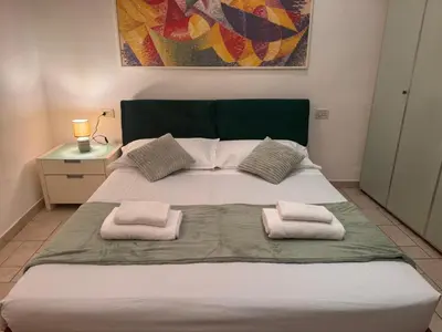 Letto o letti in una camera di La Luna Suite