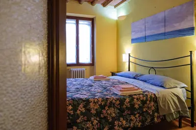 Letto o letti in una camera di il Giglio di San Giovanni