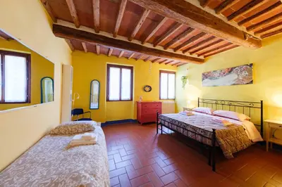 Letto o letti in una camera di il Giglio di San Giovanni