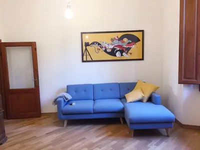 Area soggiorno di Charming Hilltop 80m apartment close to center and EUI