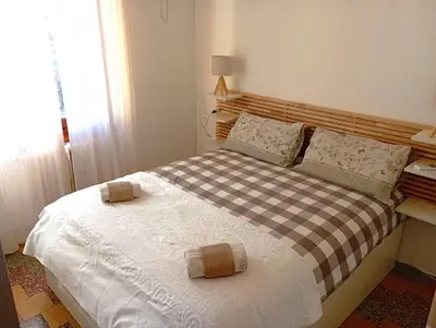 Letto o letti in una camera di Casa Maki Firenze