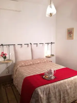 Letto o letti in una camera di Dimora Pieri