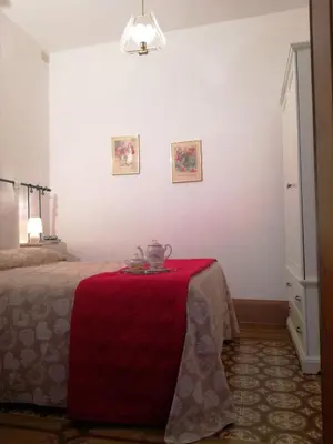 Letto o letti in una camera di Dimora Pieri