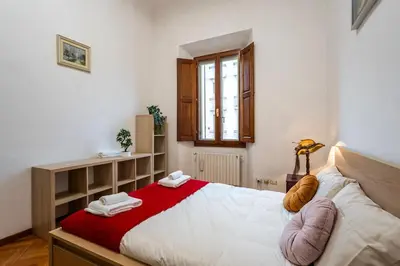 Letto o letti in una camera di Orcagna Apartment