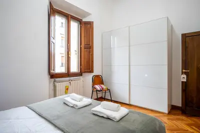 Letto o letti in una camera di Orcagna Apartment
