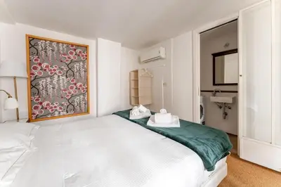 Letto o letti in una camera di Boutique Lungarno Guicciardini