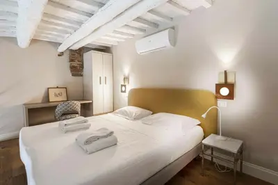 Letto o letti in una camera di Alfani Modern Loft by MMega
