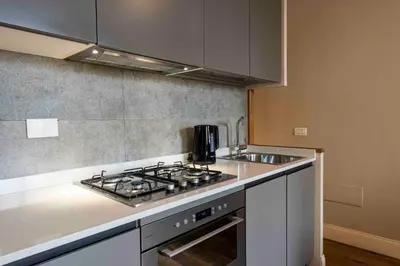 Cucina o angolo cottura di Alfani Modern Loft by MMega