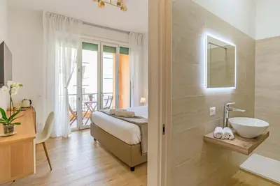 Letto o letti in una camera di Casa Eleonora