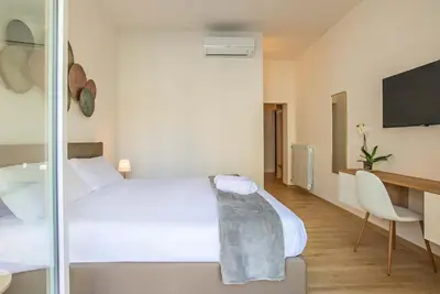 Letto o letti in una camera di Casa Eleonora