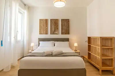 Letto o letti in una camera di Casa Eleonora