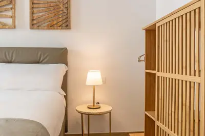 Letto o letti in una camera di Casa Eleonora