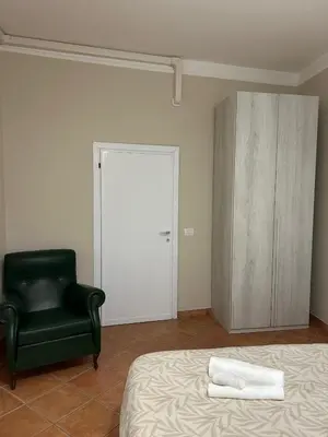 Letto o letti in una camera di Casa Garibaldi