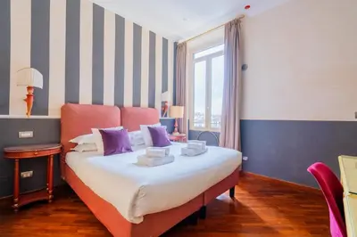 Letto o letti in una camera di SMN Suites