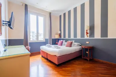 Letto o letti in una camera di SMN Suites