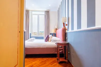 Letto o letti in una camera di SMN Suites