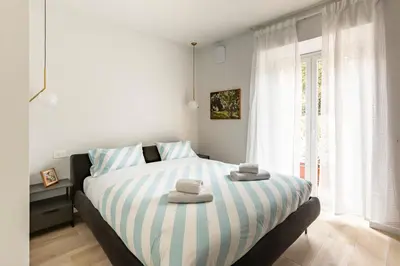 Letto o letti in una camera di GuestHost - Galliano 24 - Lovely Nest in Florence