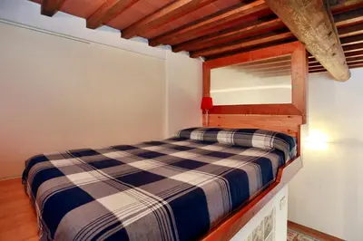 Letto o letti in una camera di Santa Croce Suite loft