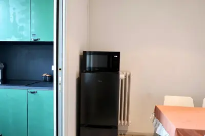Cucina o angolo cottura di Spacious Esthers Room E Near SMN