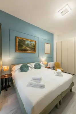 Letto o letti in una camera di Via della Villa Demidoff, 64 d - Florence Charming Apartments - New Bright Apartment with Tram 50m and Free Parking