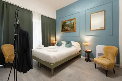 Letto o letti in una camera di Via della Villa Demidoff, 64 d - Florence Charming Apartments - New Bright Apartment with Tram 50m and Free Parking