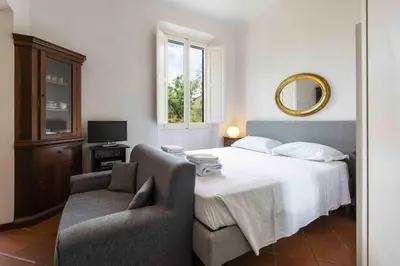 Letto o letti in una camera di Borgo Allegri Palace By MMega