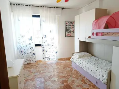 Letto o letti in una camera di Dimora Garibaldi 1