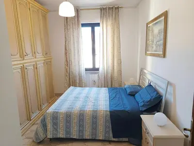 Letto o letti in una camera di Dimora Garibaldi 1