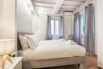 Letto o letti in una camera di Apartments Florence - Silver Glow