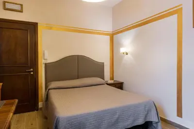 Letto o letti in una camera di Apartments Florence - Ariento Vittoria