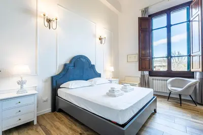 Letto o letti in una camera di Residenza Signorile nel Cuore di Firenze