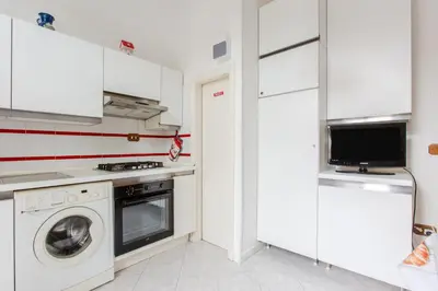 Cucina o angolo cottura di GuestHost - An Oasis in Florence - Roomy Flat with Parking