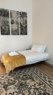 Letto o letti in una camera di La Magnolia Firenze