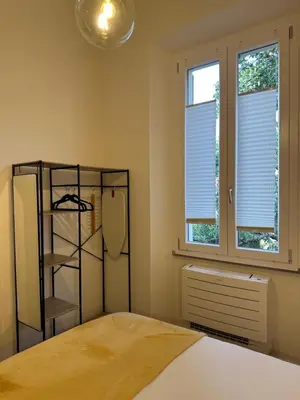 Letto o letti in una camera di La Magnolia Firenze