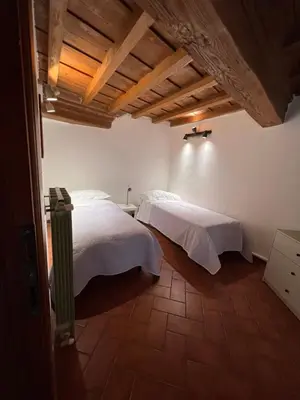 Letto o letti in una camera di Coach 87