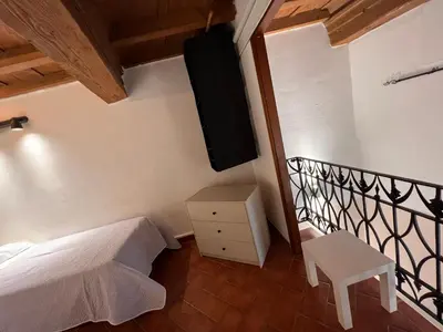 Letto o letti in una camera di Coach 87